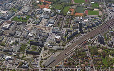 Der Bahnhof Vaihingen und Teile des Synergieparks aus der Luft gesehen. Foto: Stadtmessungsamt/Stadt Stuttgart